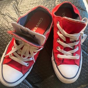 Red converse tennis shoes
